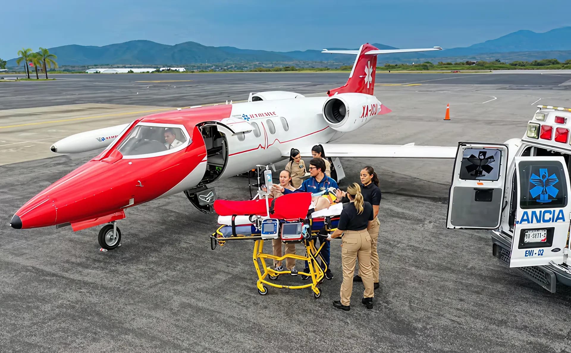 Emergency medical team with ambulance plane